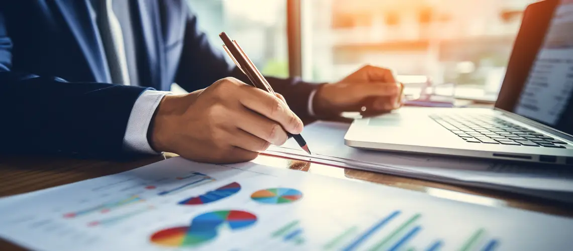 Business valuation expert analysing financial reports